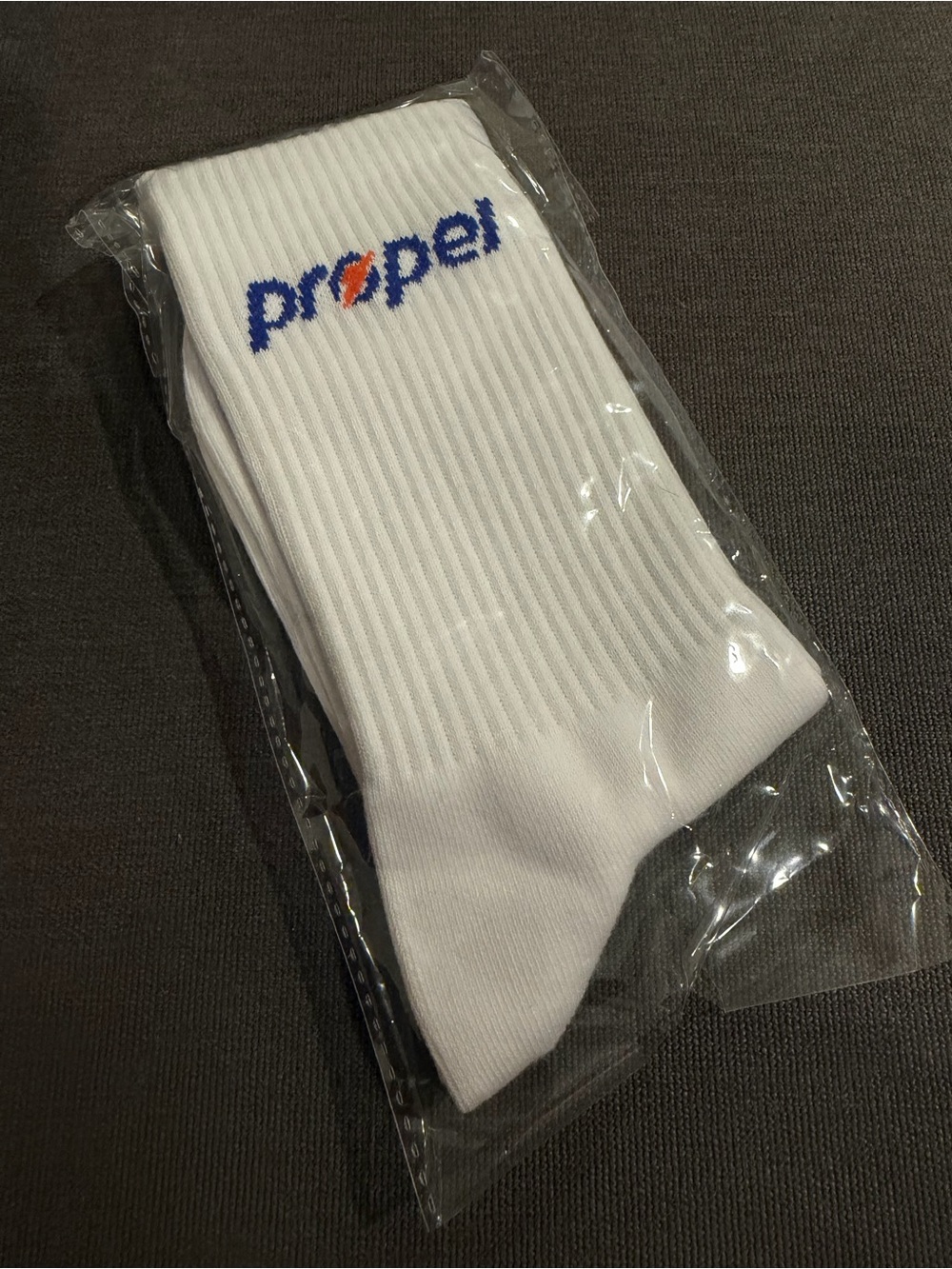 Men’s White Ribbed Crew Socks with Blue & Orange Propel Logo